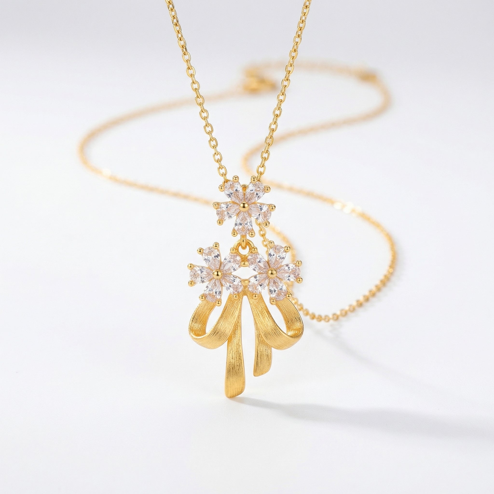 Elegant floral bowknot pendant necklace with cubic zirconia