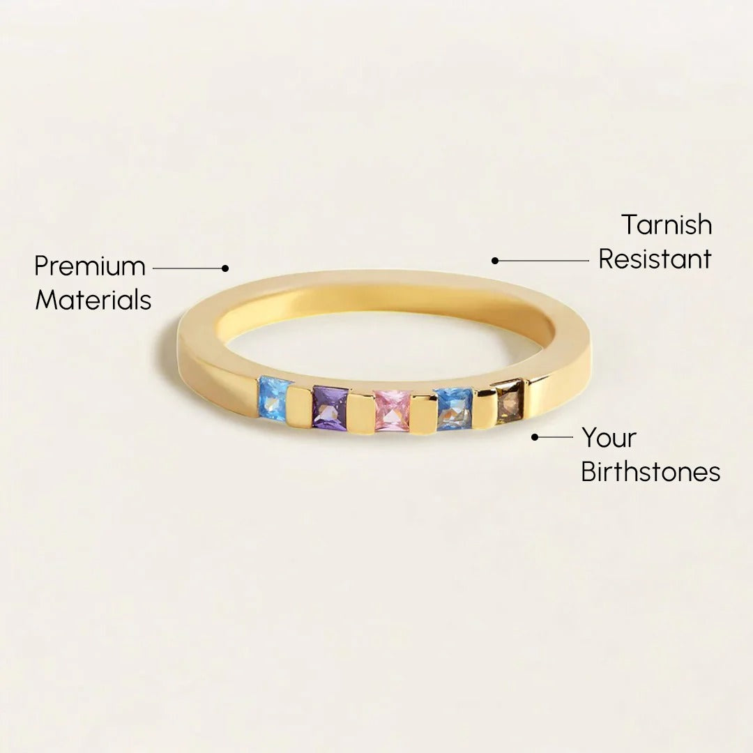 Princess-Cut Birthstone Band Ring - Gold / 7 Princess-Cut Birthstone Band Ring - Gold / 7 Collection of gemstones corresponding to each month's birthstone on a light gray background. Princess-Cut Birthstone Band Ring